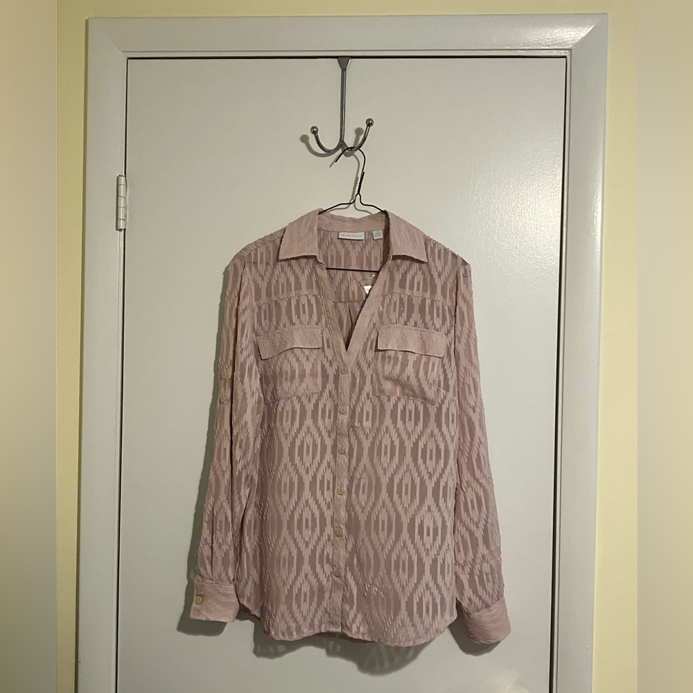 Light pink button down blouse in medium.
